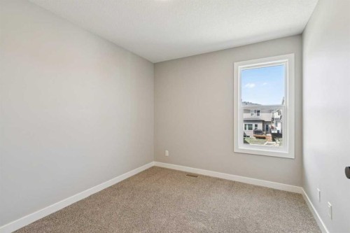 400 Fireside Drive, Cochrane, AB - Indoor Photo Showing Other Room