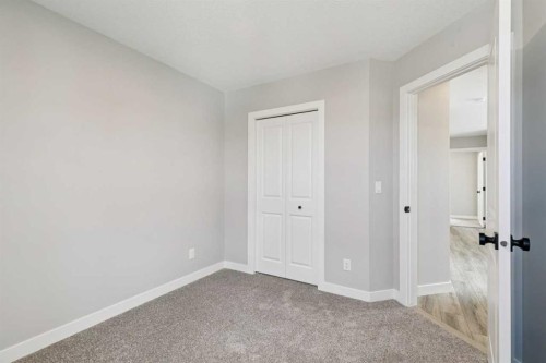 400 Fireside Drive, Cochrane, AB - Indoor Photo Showing Other Room