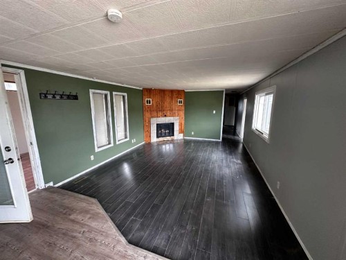 68 Norby Crescent, Red Deer, AB - Indoor Photo Showing Other Room With Fireplace