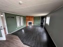 68 Norby Crescent, Red Deer, AB  - Indoor Photo Showing Other Room With Fireplace 