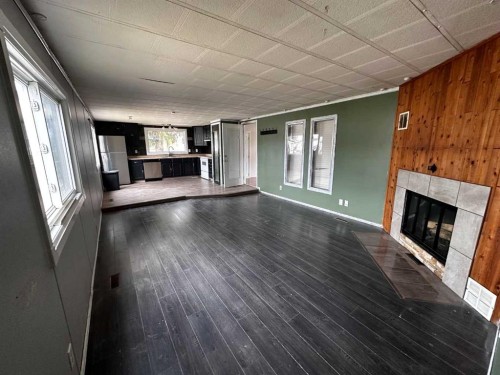 68 Norby Crescent, Red Deer, AB - Indoor With Fireplace