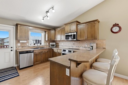 114 Stephenson Crescent, Red Deer, AB - Indoor Photo Showing Kitchen With Double Sink