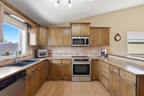 114 Stephenson Crescent, Red Deer, AB - Indoor Photo Showing Kitchen With Stainless Steel Kitchen With Double Sink