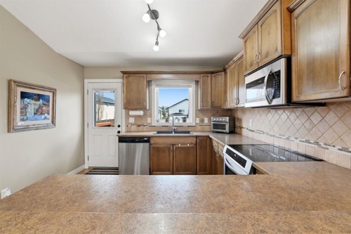 114 Stephenson Crescent, Red Deer, AB - Indoor Photo Showing Kitchen With Stainless Steel Kitchen