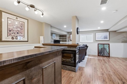 114 Stephenson Crescent, Red Deer, AB - Indoor Photo Showing Other Room With Fireplace