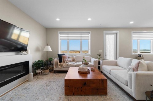 3702 76 Street, Camrose, AB - Indoor Photo Showing Living Room With Fireplace