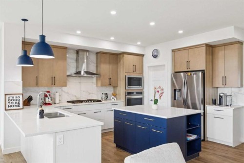814 Bluerock Way Sw, Calgary, AB - Indoor Photo Showing Kitchen With Double Sink With Upgraded Kitchen