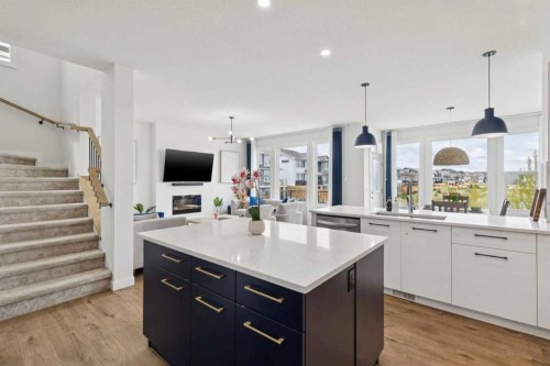814 Bluerock Way Sw, Calgary, AB - Indoor Photo Showing Kitchen With Upgraded Kitchen