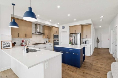 814 Bluerock Way Sw, Calgary, AB - Indoor Photo Showing Kitchen With Double Sink With Upgraded Kitchen