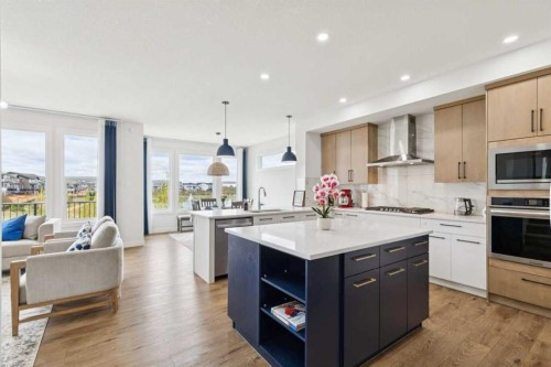 814 Bluerock Way Sw, Calgary, AB - Indoor Photo Showing Kitchen With Upgraded Kitchen