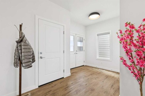 814 Bluerock Way Sw, Calgary, AB - Indoor Photo Showing Other Room