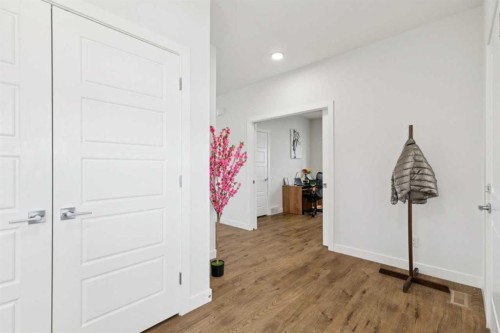 814 Bluerock Way Sw, Calgary, AB - Indoor Photo Showing Other Room
