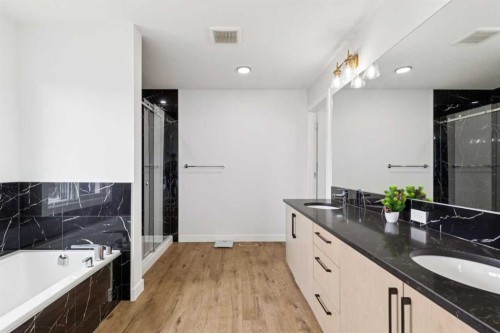 814 Bluerock Way Sw, Calgary, AB - Indoor Photo Showing Bathroom