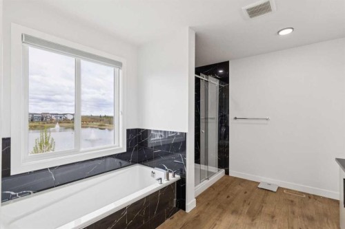 814 Bluerock Way Sw, Calgary, AB - Indoor Photo Showing Bathroom