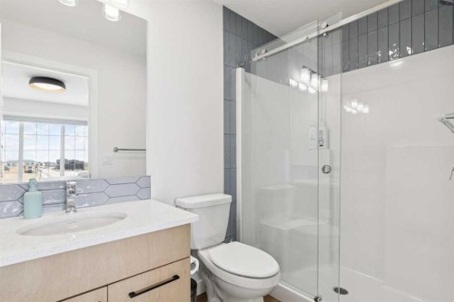 814 Bluerock Way Sw, Calgary, AB - Indoor Photo Showing Bathroom