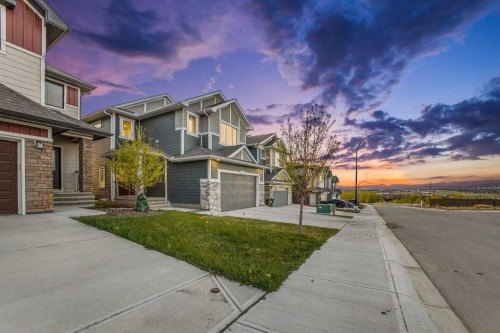 814 Bluerock Way Sw, Calgary, AB - Outdoor With Facade