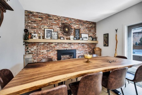 2021 112A Street, Edmonton, AB - Indoor Photo Showing Dining Room With Fireplace