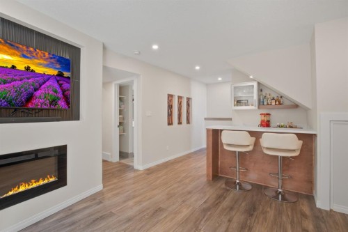 14 Tagish Avenue, Red Deer, AB - Indoor Photo Showing Living Room With Fireplace