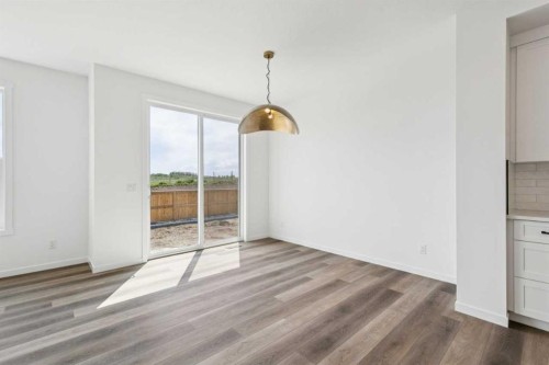 156 Southborough Common, Cochrane, AB - Indoor Photo Showing Other Room