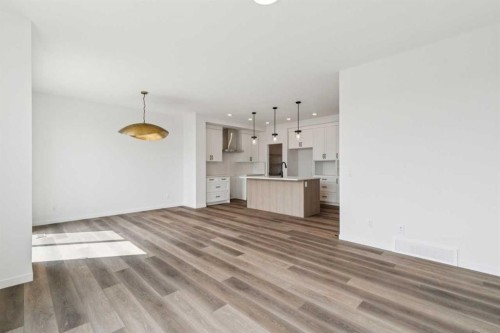 156 Southborough Common, Cochrane, AB - Indoor Photo Showing Kitchen