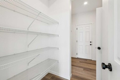 156 Southborough Common, Cochrane, AB - Indoor With Storage
