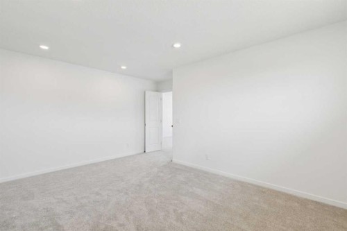 156 Southborough Common, Cochrane, AB - Indoor Photo Showing Other Room