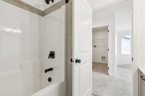 156 Southborough Common, Cochrane, AB - Indoor Photo Showing Bathroom