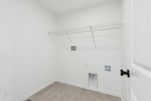 156 Southborough Common, Cochrane, AB - Indoor With Storage