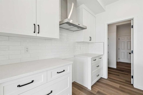 156 Southborough Common, Cochrane, AB - Indoor Photo Showing Kitchen