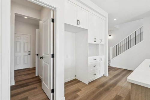 156 Southborough Common, Cochrane, AB - Indoor Photo Showing Other Room