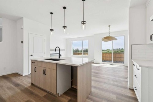 156 Southborough Common, Cochrane, AB - Indoor Photo Showing Kitchen