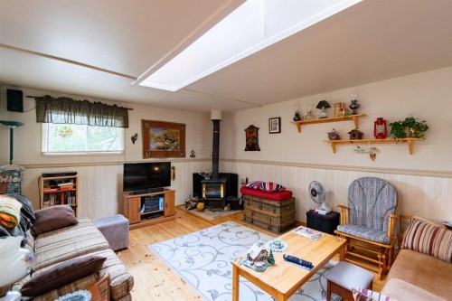 14 & 16 4 Street, White Sands, AB - Indoor Photo Showing Living Room With Fireplace