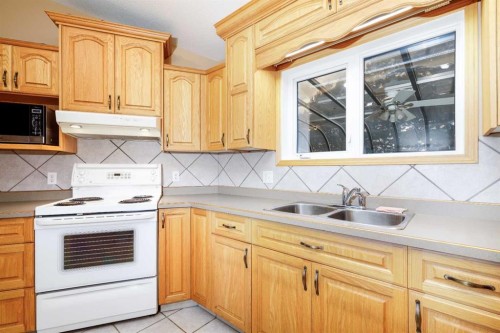 39508B Rr271, Rural Lacombe County, AB - Indoor Photo Showing Kitchen With Double Sink
