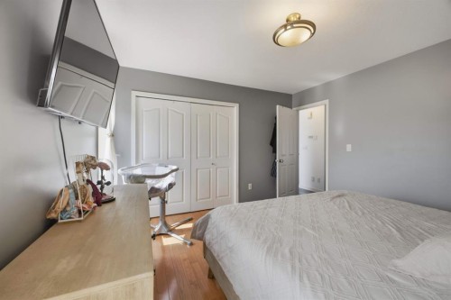 62 Mcdougall Close, Penhold, AB - Indoor Photo Showing Bedroom