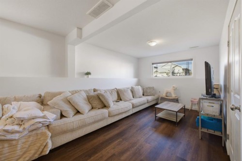 62 Mcdougall Close, Penhold, AB - Indoor Photo Showing Living Room