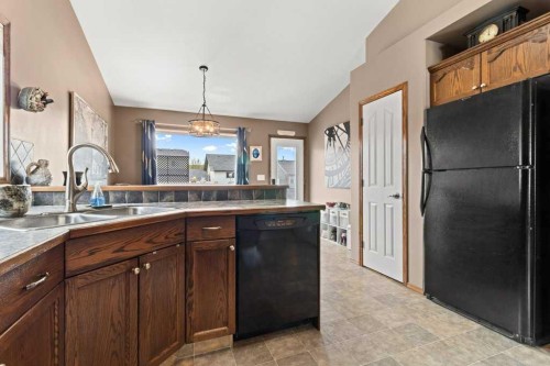 179 Issard Close, Red Deer, AB - Indoor Photo Showing Kitchen With Double Sink