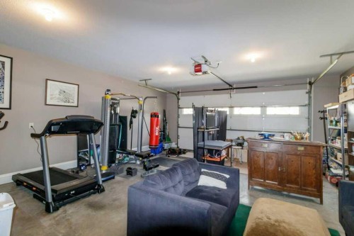 179 Issard Close, Red Deer, AB - Indoor Photo Showing Gym Room
