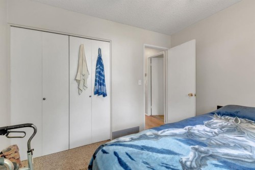 64 Sylvan Drive, Sylvan Lake, AB - Indoor Photo Showing Bedroom