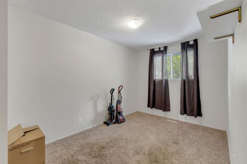 64 Sylvan Drive, Sylvan Lake, AB - Indoor Photo Showing Other Room