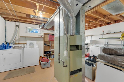 64 Sylvan Drive, Sylvan Lake, AB - Indoor Photo Showing Laundry Room