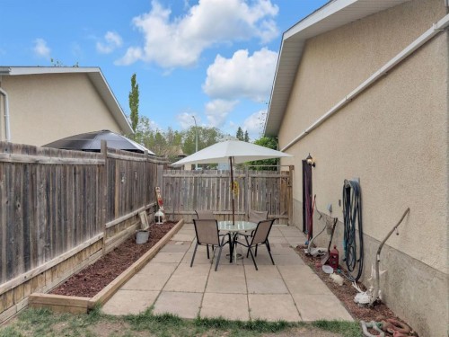 64 Sylvan Drive, Sylvan Lake, AB - Outdoor With Deck Patio Veranda With Exterior