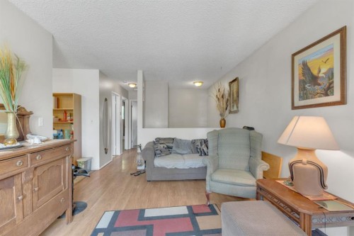 64 Sylvan Drive, Sylvan Lake, AB - Indoor Photo Showing Living Room