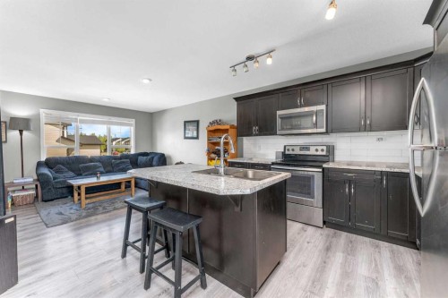 22 Hawthorn Place, Sylvan Lake, AB - Indoor Photo Showing Kitchen With Stainless Steel Kitchen With Double Sink