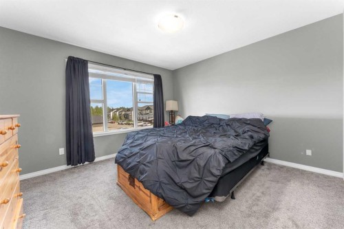 22 Hawthorn Place, Sylvan Lake, AB - Indoor Photo Showing Bedroom