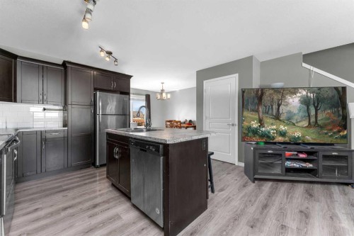 22 Hawthorn Place, Sylvan Lake, AB - Indoor Photo Showing Kitchen With Stainless Steel Kitchen With Double Sink