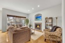 132 Ingle Close, Red Deer, AB  - Indoor Photo Showing Living Room With Fireplace 