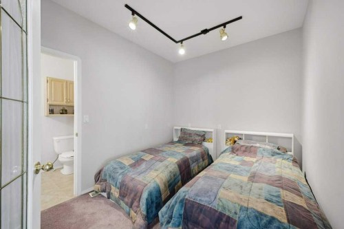 54 Lord Close, Red Deer, AB - Indoor Photo Showing Bedroom