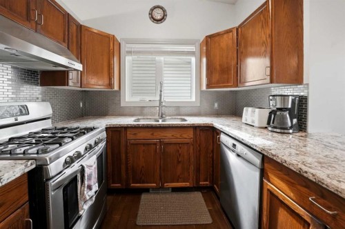 76 Dixon Crescent, Red Deer, AB - Indoor Photo Showing Kitchen With Double Sink