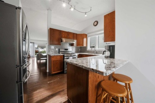 76 Dixon Crescent, Red Deer, AB - Indoor Photo Showing Kitchen With Upgraded Kitchen