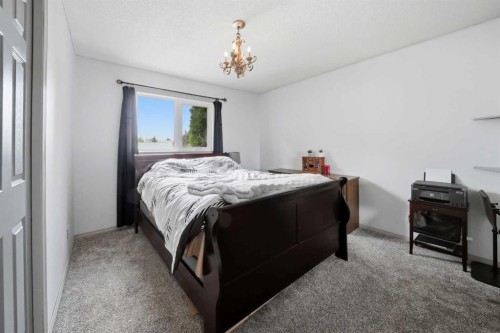 76 Dixon Crescent, Red Deer, AB - Indoor Photo Showing Bedroom